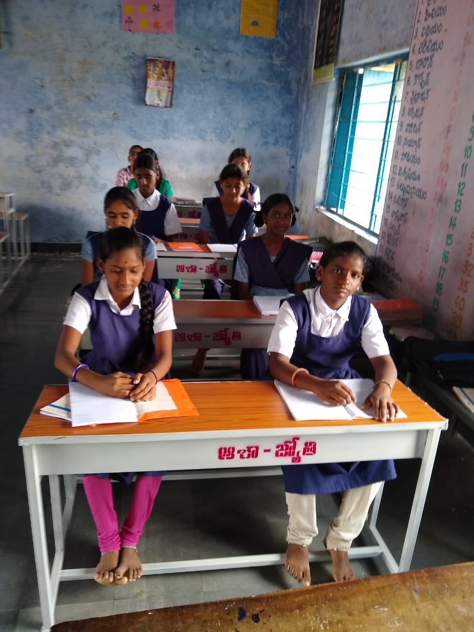 Benches and desks to school children